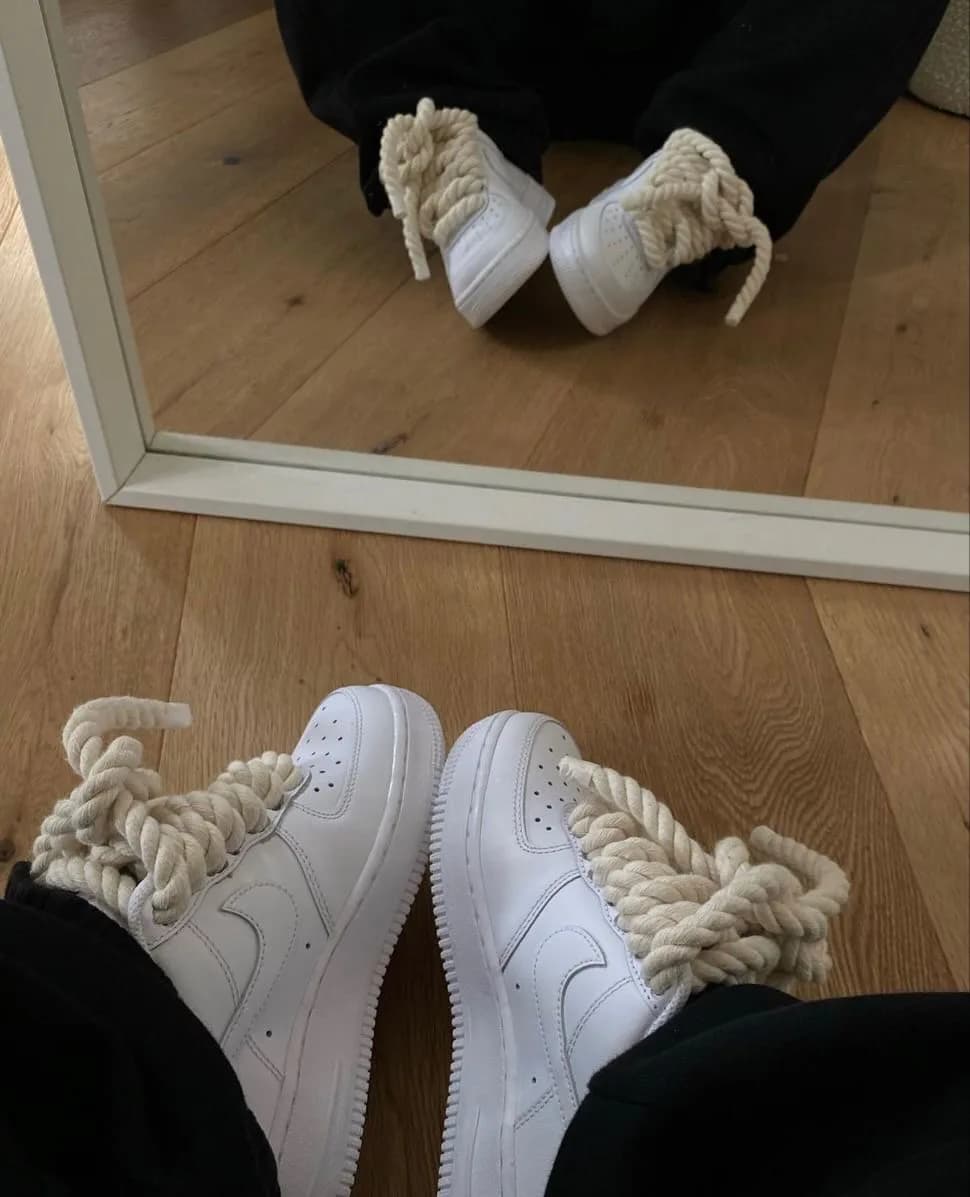 White sneakers with statement rope laces