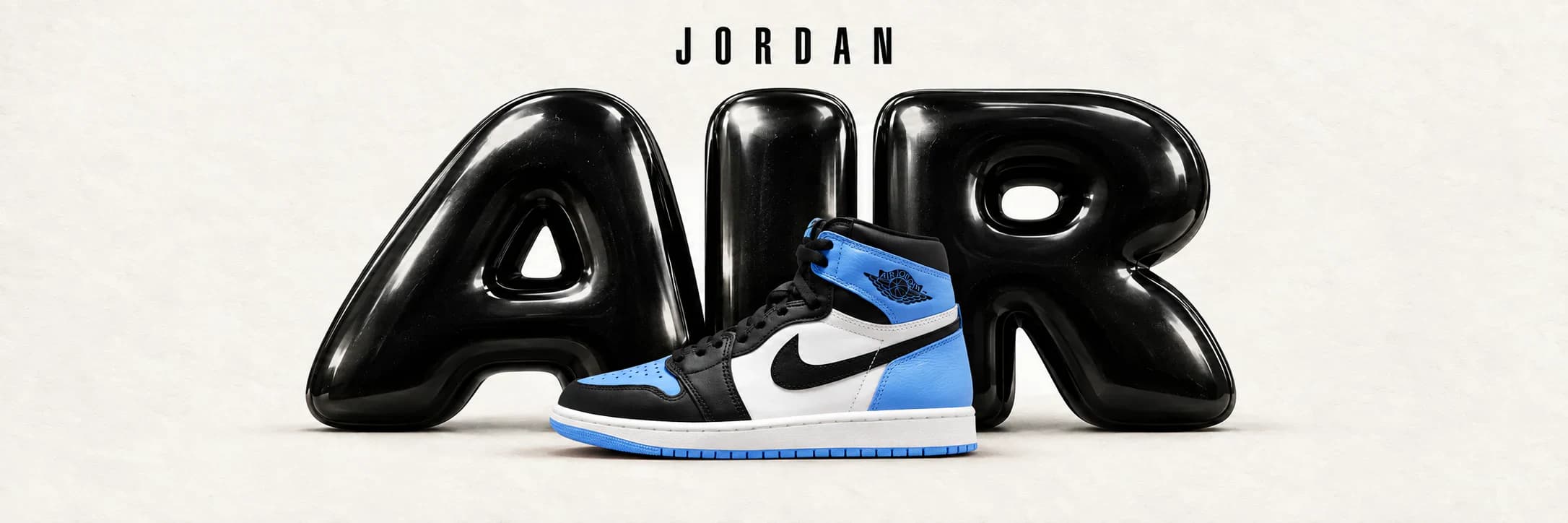Air Jordan 1 Retro High UNC Toe in front of black AIR lettering