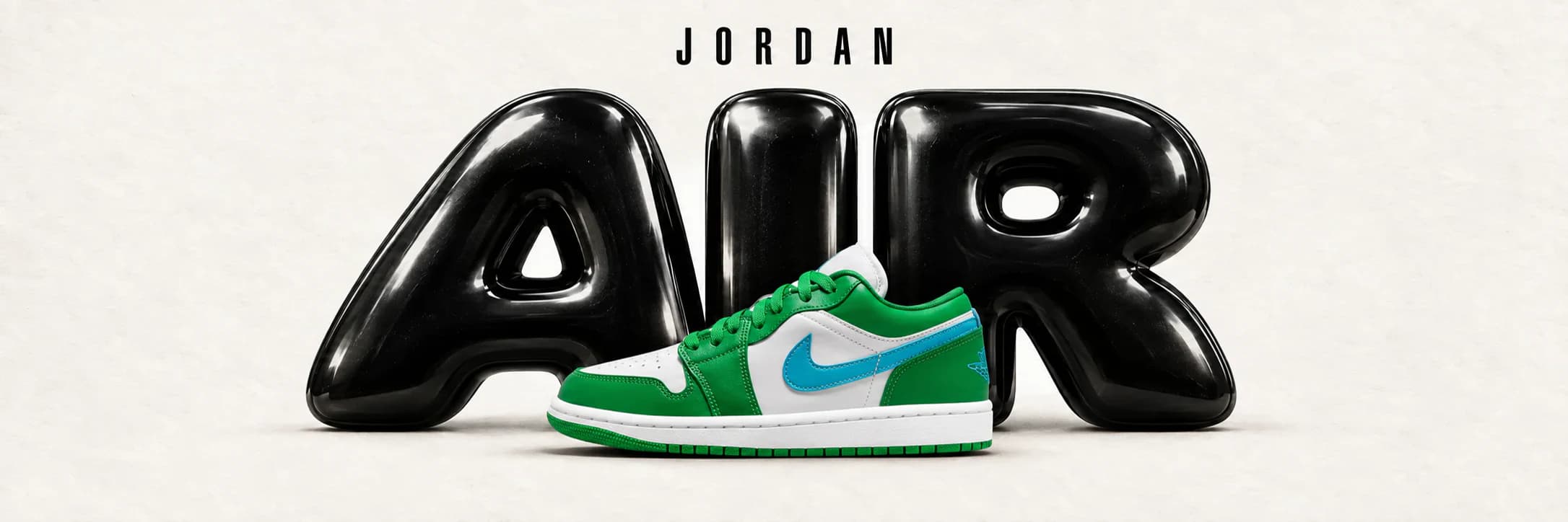 Air Jordan 1 Low Lucky Green Aquatone in front of black AIR lettering